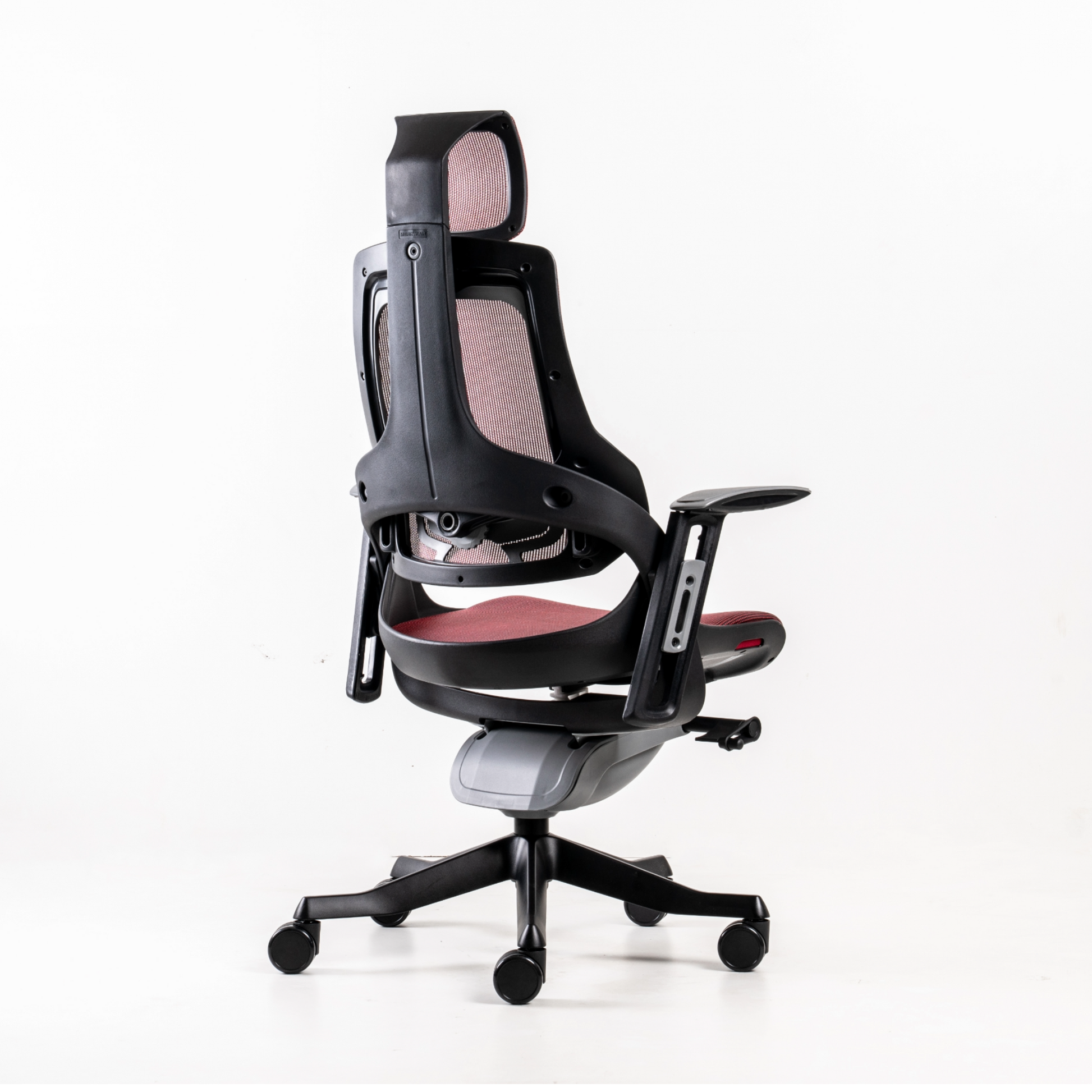 Backrest: Adjustable for Height and Lumbar Depth: White or black outer shell, grey inner shell, lumbar knob and caps of polypropylene (100% recyclabel). Back frame in white fiber-reinforced polypropylene (100% recyclable).