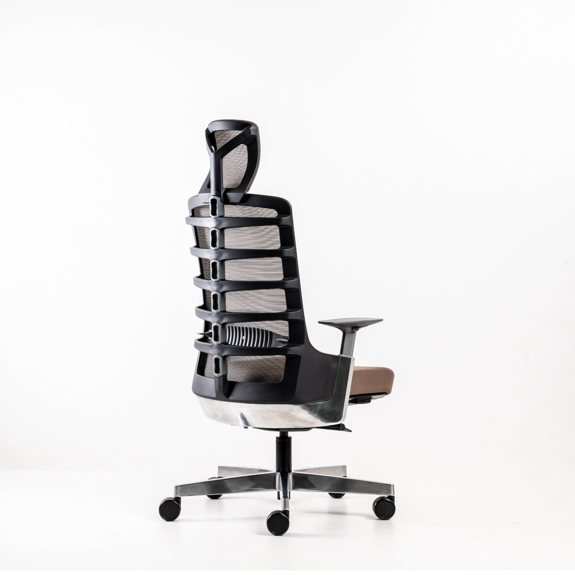 Backrest: Height-adjustable lumbar support  with a range of 55mm.Polypropylene  (100% recyclable) frame in black or  white colour option.